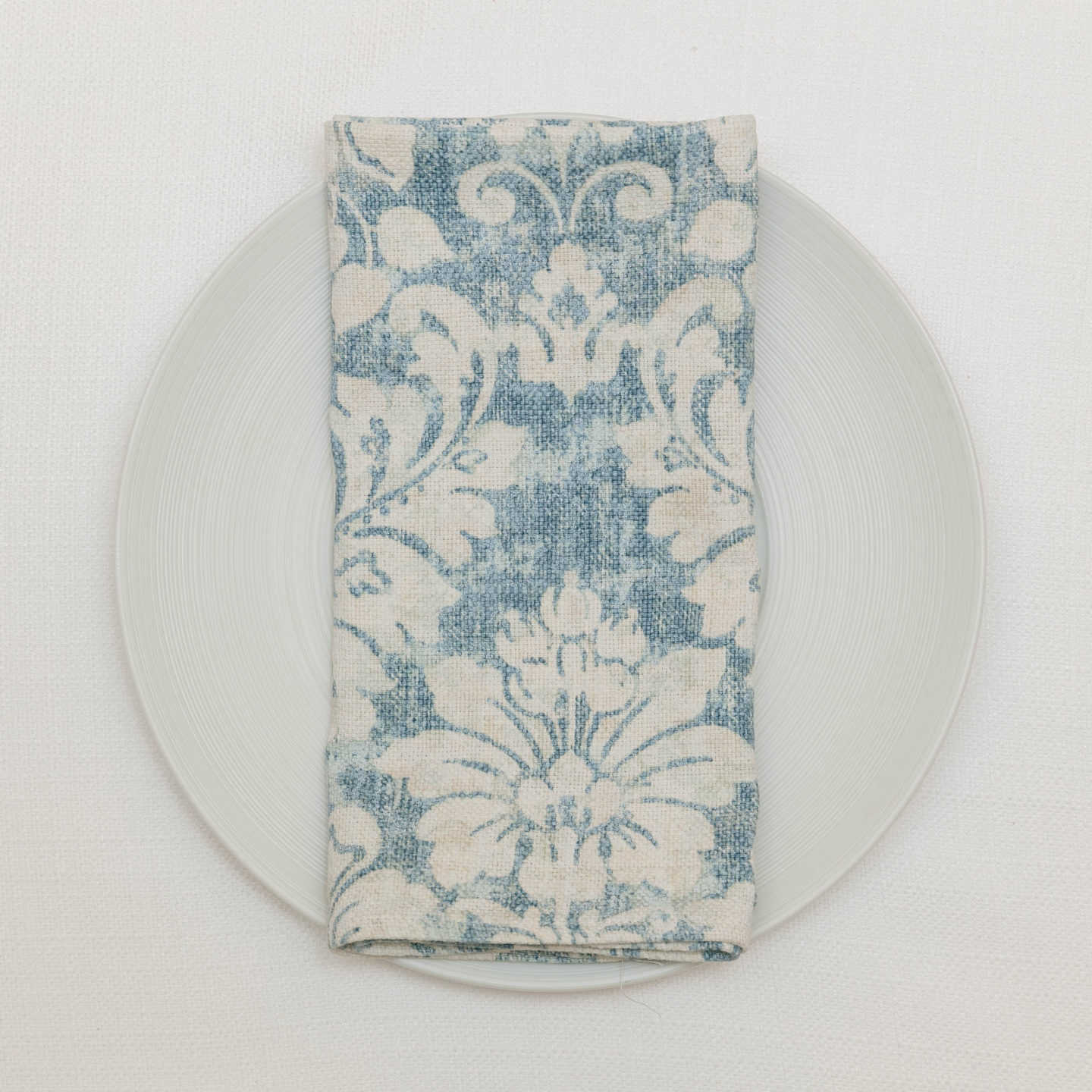 blue and white floral napkin