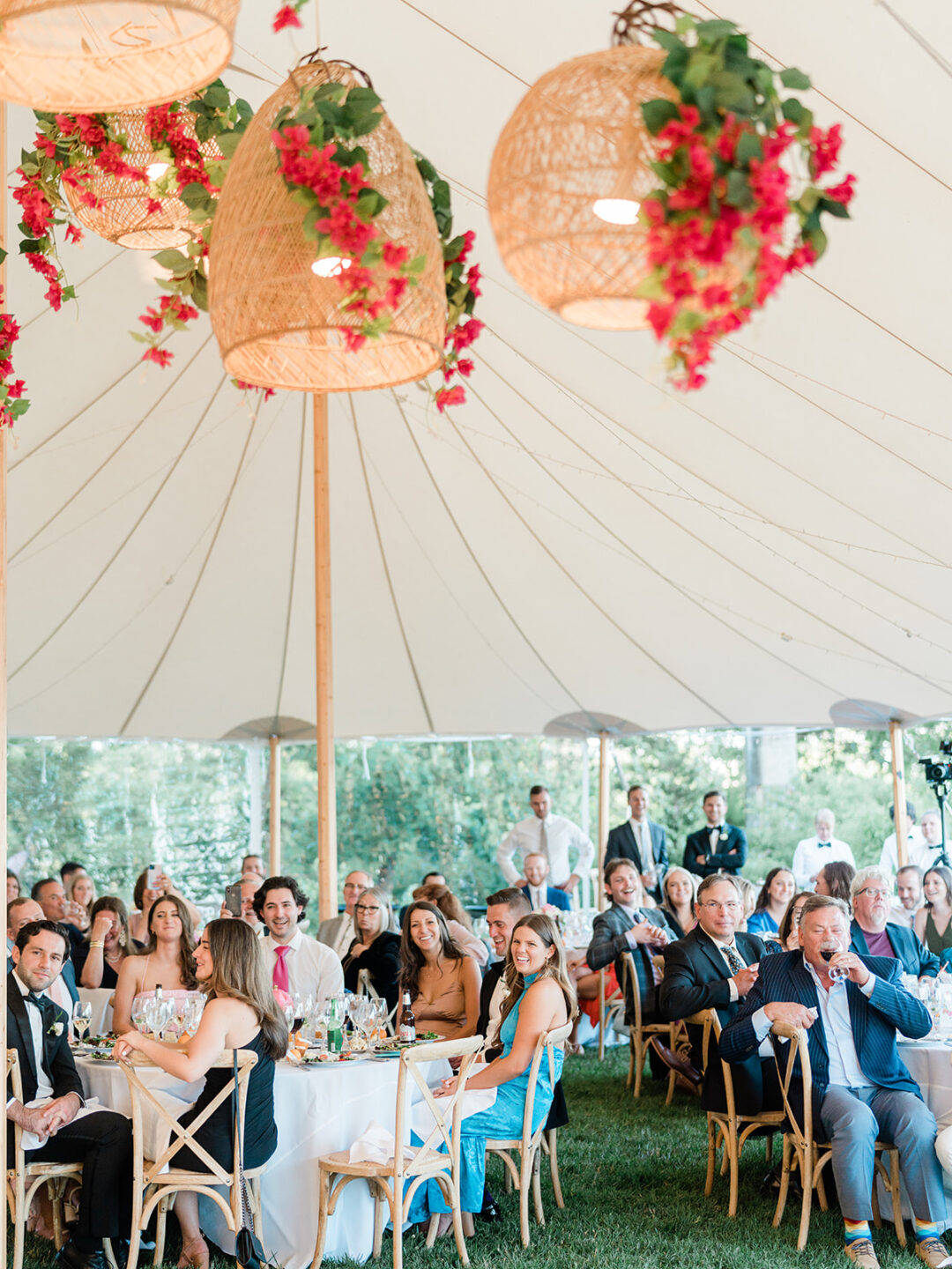 wedding guests watching first dance under a sperry sailcloth tent