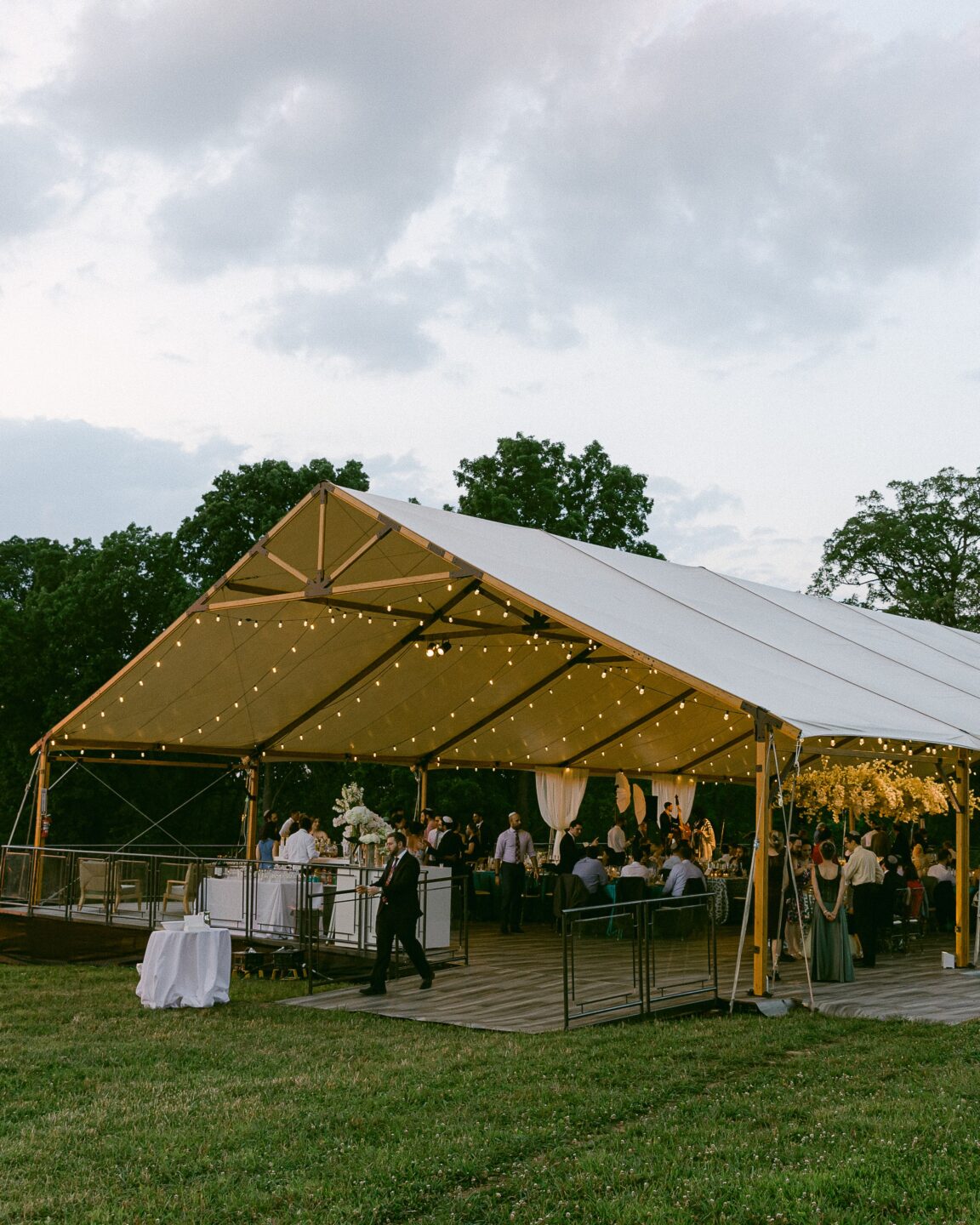 timbertrac tent with string lights draping from support poles 