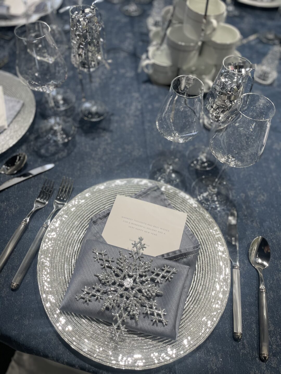 frosty themed holiday tablescape idea blue and silver