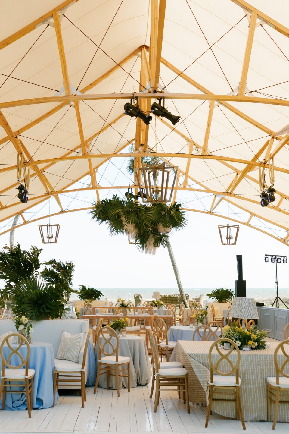 Inside the Amelia Sperry Tent featuring styled tables, luxe linens, and seating for up to 140 guests.