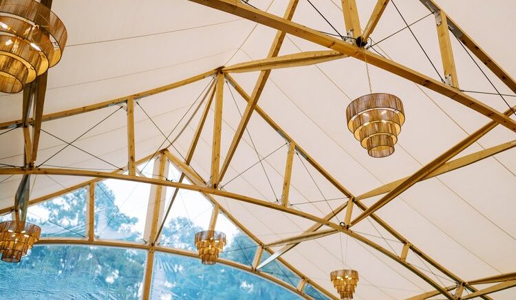 Close-up of the Amelia Sperry Tent’s sailcloth fabric and handcrafted pole details highlighting Sperry’s craftsmanship.