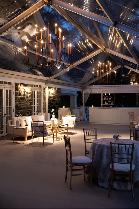 Clear vinyl patio enclosures and sidewalls extending outdoor seating during cold weather months.